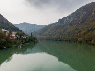 The river Drina flows between the high mountains near the town of Visegrad