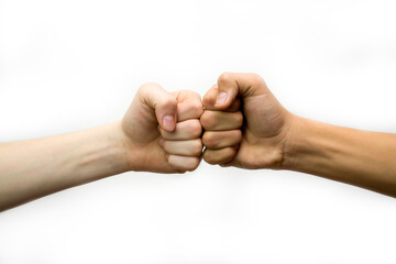 The blow of two fists on a white background, the meeting of friends, the olicitation of the...