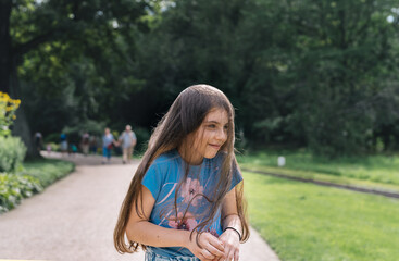 Content girl having fun in park