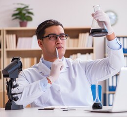 Young lab assistan working in the laboratory