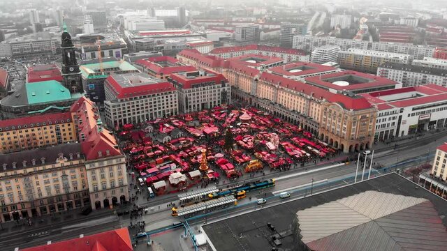 Drone shot Striezelmarkt Christmas market in Dresden.
Christmas toys of fairy tale characters at the fair in Dresden. Christmas in Dresden. Handmade toys. The oldest Christmas markets in the world. 