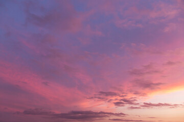 Beautiful sunrise, sunset purple pink violet blue sky with clouds abstract background texture	
