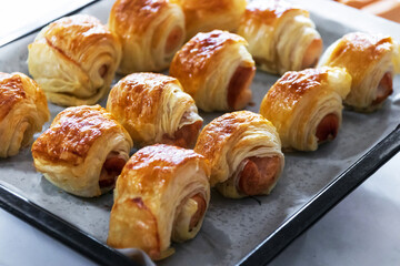 Homemade mini sausage puff pastry just out of the oven.