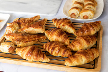 Homemade tuna puff pastry, croissant and sausage puff pastry just out of the oven. 