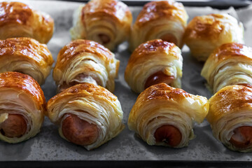 Homemade mini sausage puff pastry just out of the oven.