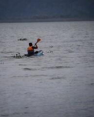 kayaking on the lake of timah tasoh in perlis malaysia