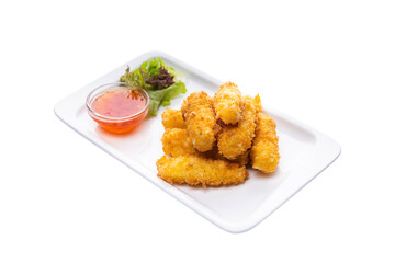 Side view of fried cheese in panko breadcrumbs served with lettuce. sweet and sour sauce in saucepan near dish isolated on white background. Fry cheese finger food
