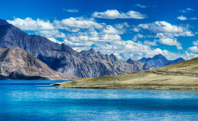 Mountains and Pangong tso (Lake). It is huge lake in Ladakh, shared by China and India along India China LOC border long and extends from India to Tibet. Leh, Ladakh, Jammu and Kashmir, India - obrazy, fototapety, plakaty