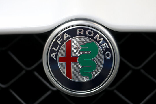 Alfa Romeo metallic logo closeup on Alfa Romeo car displayed at 3rd edition of MOTO SHOW in Cracow Poland. Exhibitors present  most interesting aspects of the automotive industry