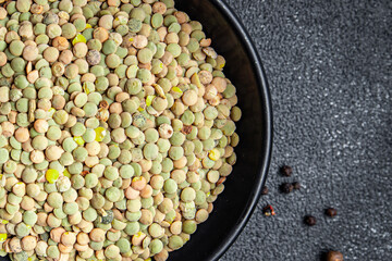 green lentils raw legumes healthy meal snack diet on the table copy space food background rustic. top view keto or paleo diet veggie vegan or vegetarian food
