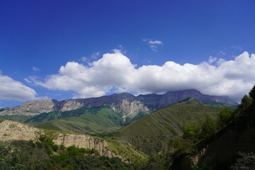 Landscape with sky and clouds. Rocks