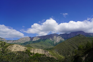Landscape with sky and clouds. Rocks