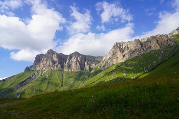 Landscape with sky and clouds. Rocks and hills