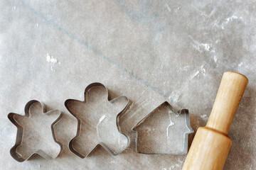 Christmas cookie molds in the form of people and a house
