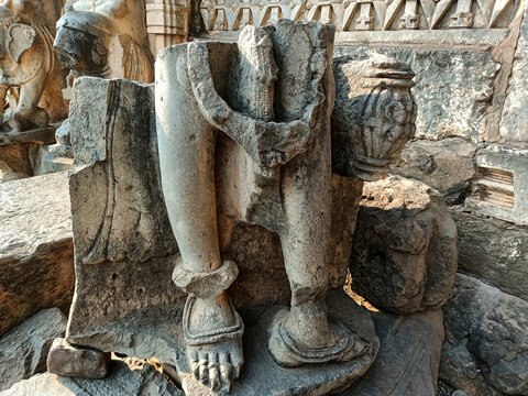 Stock photo of Intricate ruined ancient sculpture of India god or goddess, carved out of gray stone in ancient hindu temple. Picture captured at Kopeshwar Mahadev Mandir Khidrapur, Maharashtra, India.