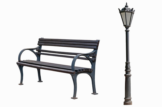 Old wooden street bench in brown tones and vintage street lamp on white isolated background