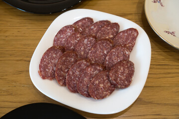 small slices of sausage slices