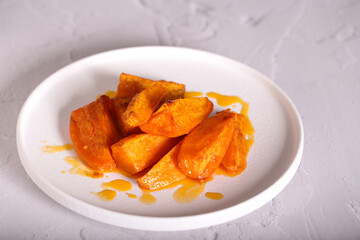 sweet potato baked in the oven with spices and oil