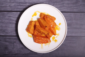 sweet potato baked in the oven with spices and oil