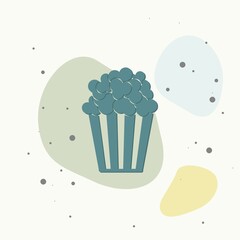Popcorn vector icon. Box of popcorn on multicolored background.