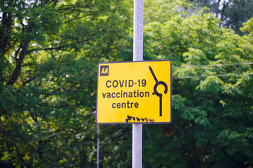 Vaccination medical centre for Covid-19 road sign 