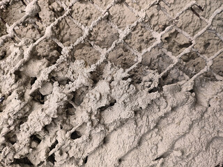texture of stone wall. concrete on cainlink fence.