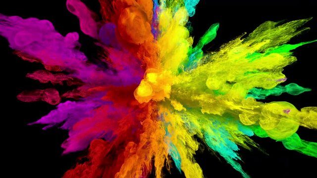 Color Burst - Colorful smoke powder explosion. Coloured fluid ink particles in slow motion. Isolated on black background. Alpha matte 4k.