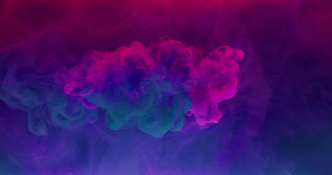 Color smoke cloud. Ink water splash. Fantasy haze texture. Logo reveal effect. Neon magenta pink blue vapor explosion abstract art background shot on RED 6k.