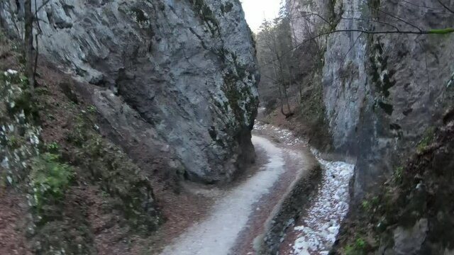 Aerial FPV drone view Prapastiile Zarnestiului, the most visited objective in Piatra Craiului. Prapastiile Zarnestiului drone fpv view