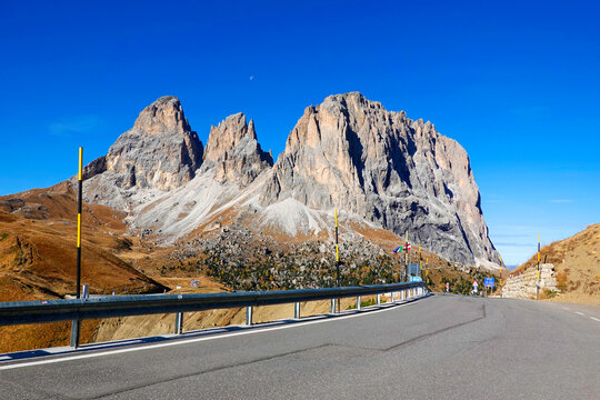Panoramic view of Sella pass located at 2240 m between the Sassolungo group and the Sella group, Trento and Bolzano province, Dolomites, Italy 