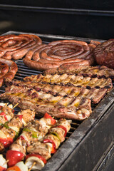 Argentine barbecue in a sunny day. Festivity, celebration, banquet.