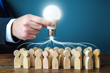 Leader concentrates team efforts on new idea. Brainstorming. Joint project. Development of...