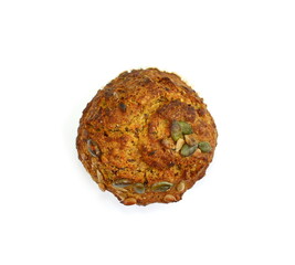 Whole grain muffin isolated on white. Nutrition concept -Healthy small salt muffin bun over white background. Healthy food, Diet, . Homemade delicious baked muffin.