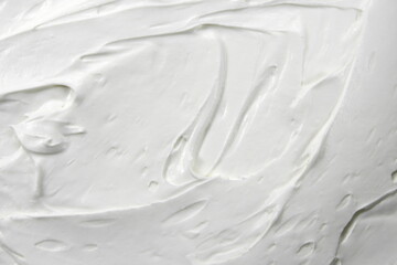 white whipped texture. latte foam, whipping cream, frothy egg white. whipped cream background.