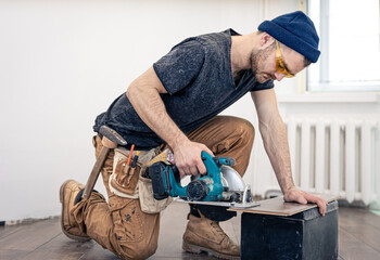 Circular Saw, carpenter using a circular saw for wood.