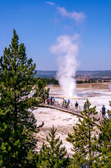 Fototapeta na wymiar Tourists at a yellowstone National park hot spot