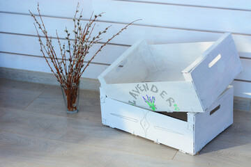 
Lavender loft-style drawers. Branches with fluffy willows in a glass on the cozy terrace country house
