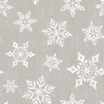 White winter snowflake on linen textured background. Christmas seamless pattern. Vector illustration. © olgdesigner