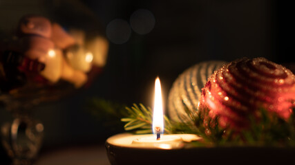 christmas candle and christmas bauble