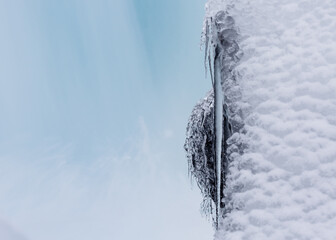 icicles at the rushing water