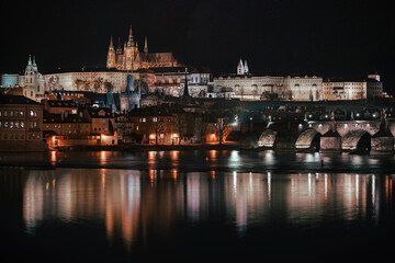  prague castle and st. vitus and cathedral bridge on ece vltava at night in the center of prague