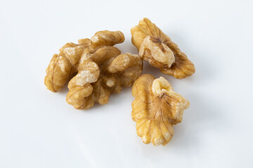 Small portion of walnut out of the shell, ready for consumption