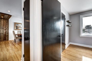 Typical budget Canadian single family house, renovated with some luxury elements in design partially furnished with kitchen, rooms, bedrooms, appliances, finished basement, laundry, backyard and patio