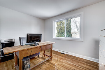 Typical budget Canadian single family house, renovated with some luxury elements in design partially furnished with kitchen, rooms, bedrooms, appliances, finished basement, laundry, backyard and patio