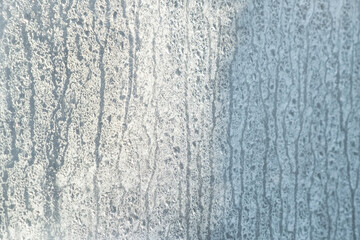 texture white frost on glass , frosty winter background.