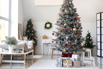 Fototapeta na wymiar Interior of living room with Christmas trees and gifts