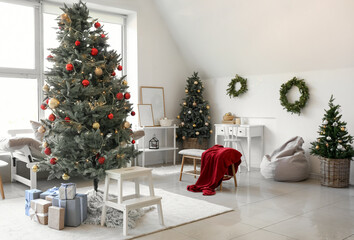 Interior of living room with Christmas trees and gifts