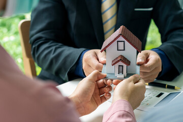 Sales managers or real estate agents offer homes to clients and, in signing leasing contracts, purchase and sell mortgage and home insurance deals in the office.