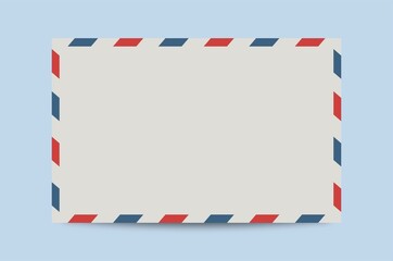 Obraz premium Realistic vintage postage envelope with red and blue border colours.