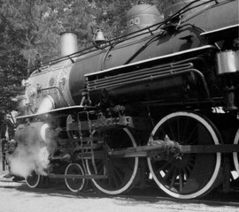 old locomotive beginning to move shoot with a film camera from 1980